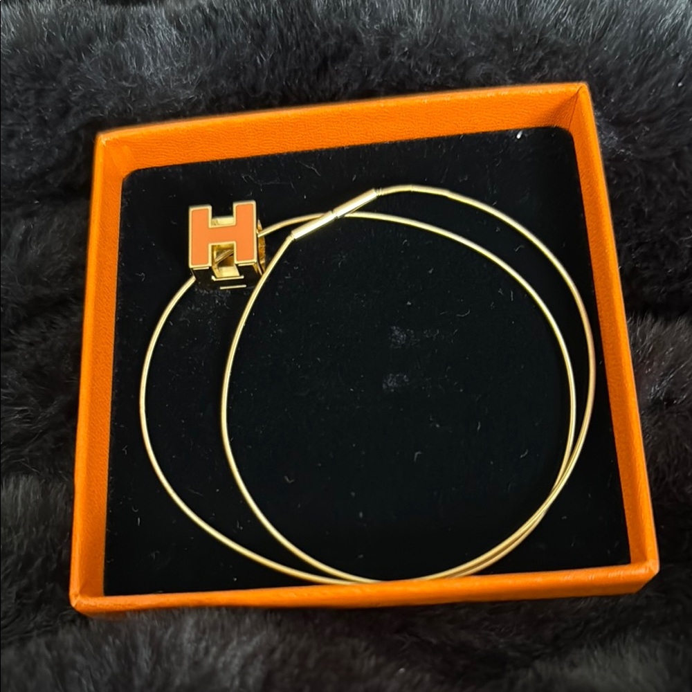 Hermes H cube necklace.